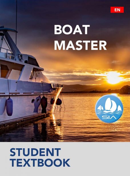 SIA student textbook cover for issa boat master course showing a motor yacht moored at sunset
