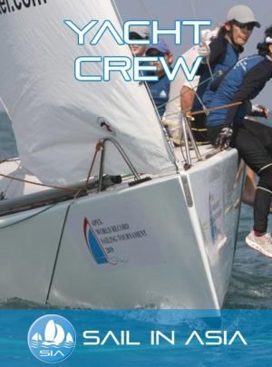 sail in asia yacht crew course header image showing a small racing yacht bow on under sail with 5 crew members balancing the boat on a turn